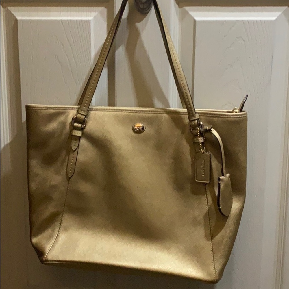 Antique gold Coach shoulder bag.